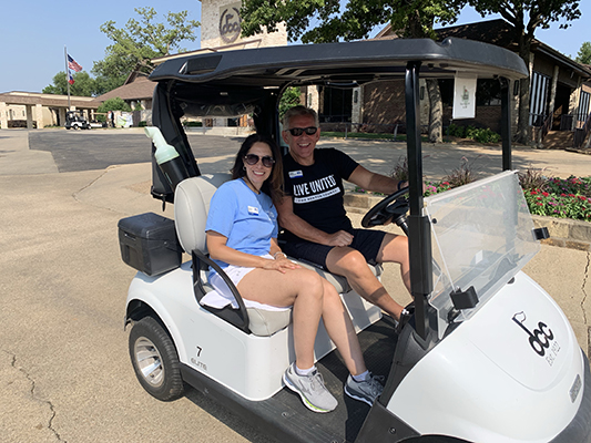 Board Chair Laura Behrens and Gary Henderson