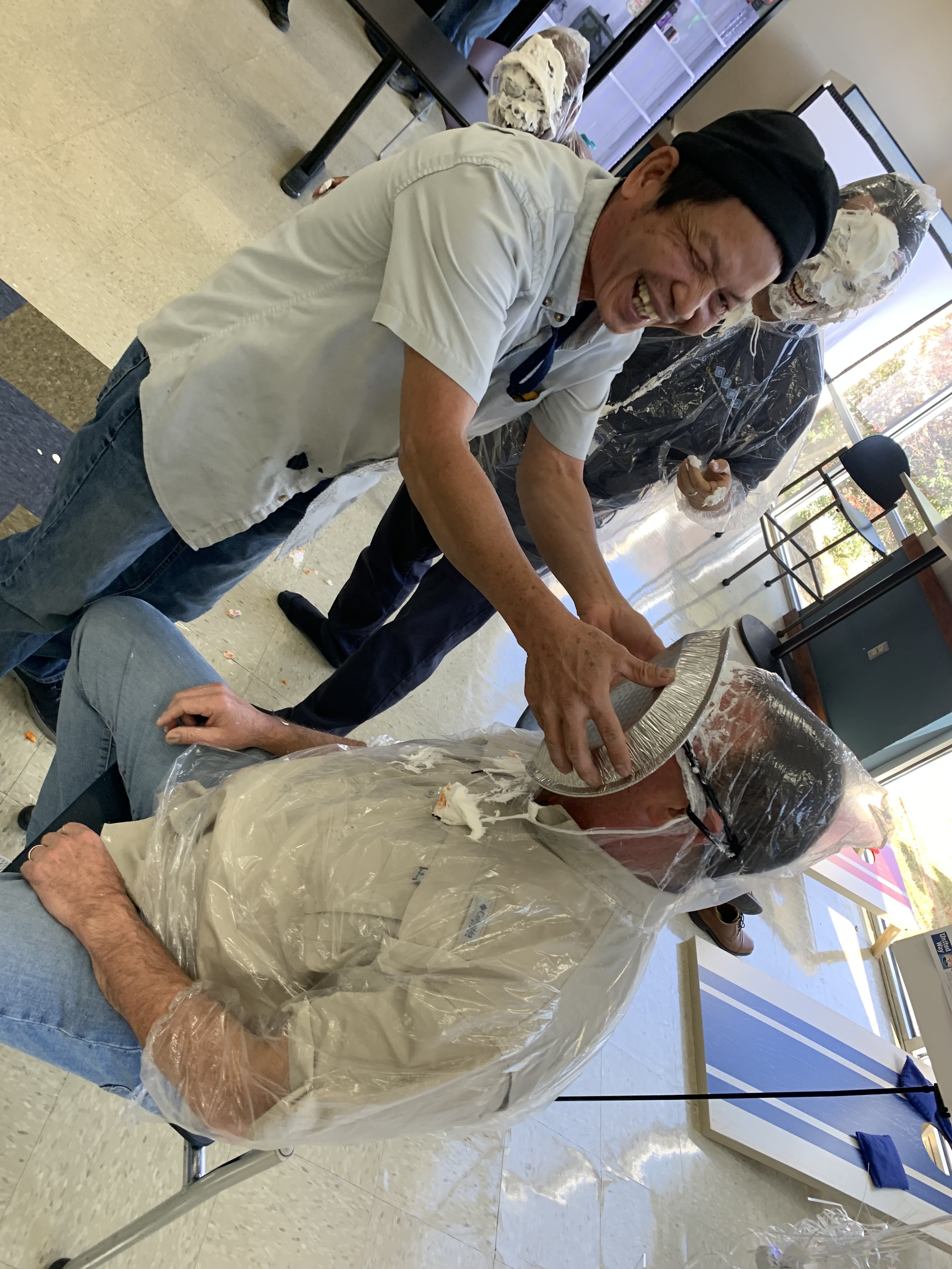 CTDI employee pies a colleague