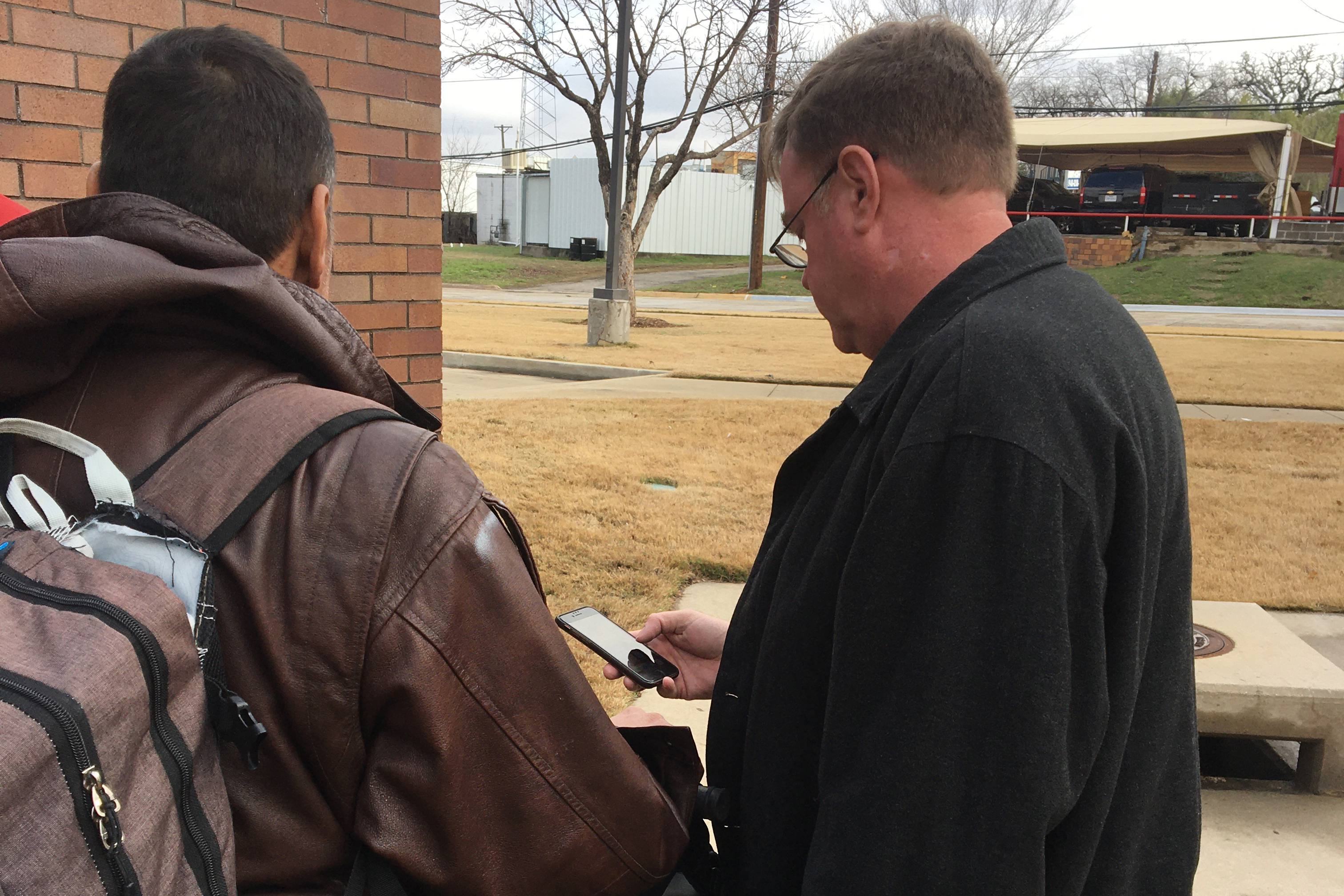 Volunteer surveying person experiencing homelessness