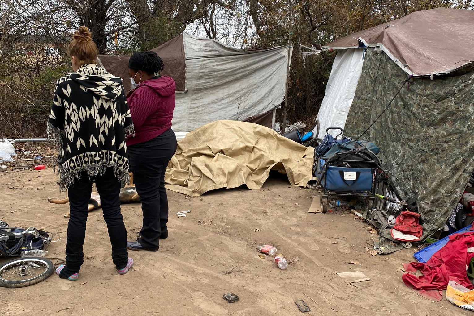 Volunteer surveying in encampment