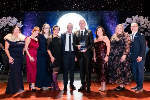 NCTC accepts their award