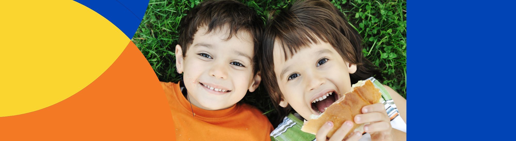 Boys eating sandwiches