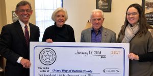Dr. Kathryn Stream, Board of Commissioners Chair for Denton Housing Authority (2nd from left), presents check to United Way of Denton County representatives (from right) Courtney Cross (Director of Homelessness Initiatives), Lyle Dresser (Board Chair), and Gary Henderson (CEO).